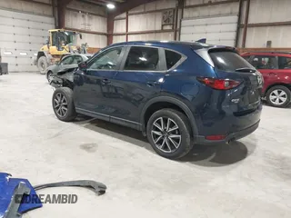 2018 Mazda CX-5 Touring with VIN JM3KFBCM5J0434716, listed as a IAAI auction lot 41738956 with 108,264 mi miles and . Bid and sale history available at DreamBid. Image 3.