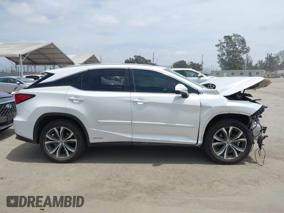 2017 Lexus RX 450h with VIN 2T2BGMCA9HC009969, listed as a IAAI auction lot 42244363 with 91,783 mi miles and . Bid and sale history available at DreamBid. Image 14.
