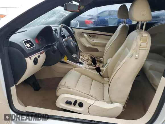 2007 Volkswagen Eos 2.0T with VIN WVWFA71F57V052000, listed as a Copart auction lot 87598495 with 128,610 mi miles and Salvage Title. Bid and sale history available at DreamBid. Image 7.