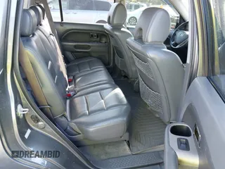 2007 Honda Pilot EX-L with VIN 2HKYF18727H528564, listed as a IAAI auction lot 42010708 with 260,364 mi miles and . Bid and sale history available at DreamBid. Image 8.