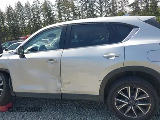 2018 Mazda CX-5 Grand Touring z VIN JM3KFADM7J0318684, wystawiony jako IAAI lot #42226937 z przebiegiem 69 166 mil mil oraz . Historia ofert i sprzedaży dostępna na DreamBid. Obrazek 14.