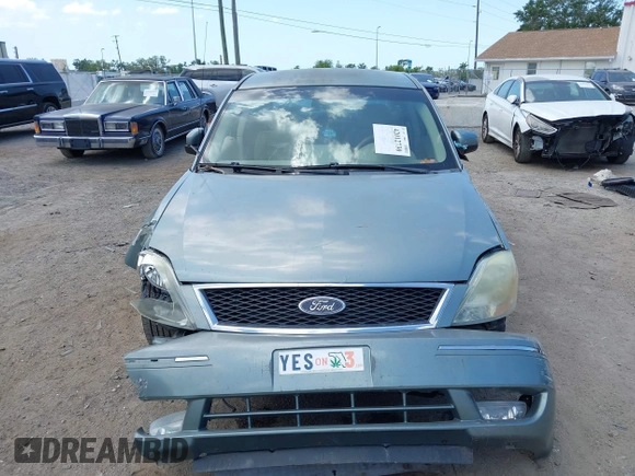 2005 Ford Five Hundred SEL z VIN 1FAFP241X5G118341, wystawiony jako IAAI lot #42012730 z przebiegiem Nie podano mil oraz . Historia ofert i sprzedaży dostępna na DreamBid. Obrazek 11.