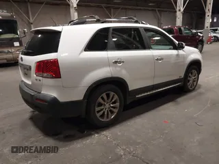 2011 Kia Sorento EX with VIN 5XYKUDA2XBG136475, listed as a IAAI auction lot 41795452 with 218,041 mi miles. Bid and sale history available at carsss.com. Image 4.