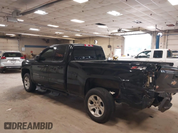2017 Chevrolet Silverado 1500 LT with VIN 1GCVKREC0HZ384747, listed as a IAAI auction lot 37311343 with 67,390 mi miles. Bid and sale history available at carsss.com. Image 3.