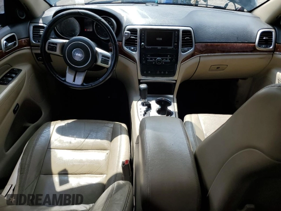 2011 Jeep Grand Cherokee Limited with VIN 1J4RR5GT4BC619724, listed as a Copart auction lot 63989905 with 212,198 mi miles and Clean title. Bid and sale history available at DreamBid. Image 8.
