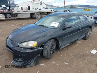 2004 Dodge Stratus SE z VIN 4B3AG42G14E134588, wystawiony jako IAAI lot #41978035 z przebiegiem 64 236 mil mil oraz . Historia ofert i sprzedaży dostępna na DreamBid. Obrazek 2.
