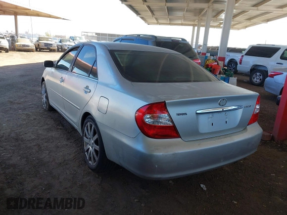 2003 Toyota Camry LE with VIN JTDBE32K730176610, listed as a IAAI auction lot 41627010 with 238,502 mi miles and . Bid and sale history available at DreamBid. Image 3.