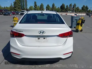2021 Hyundai Accent SE z VIN 3KPC24A6XME153337, wystawiony jako IAAI lot #42344593 z przebiegiem 86 079 mil mil oraz . Historia ofert i sprzedaży dostępna na DreamBid. Obrazek 16.