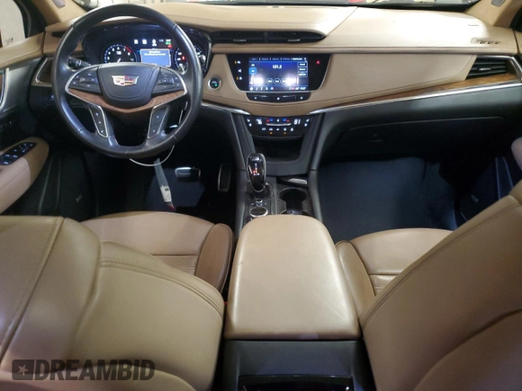 2021 Cadillac XT5 AWD Sport with VIN 1GYKNHRS1MZ103033, listed as a Copart auction lot 58586425 with 65,229 mi miles and Salvage title. Bid and sale history available at DreamBid. Image 8.