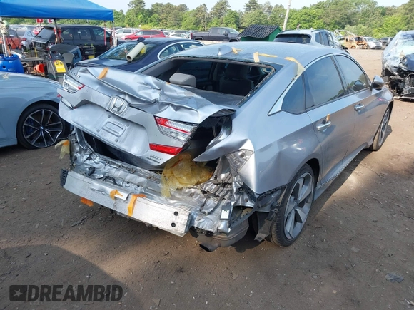2020 Honda Accord Touring z VIN 1HGCV2F93LA017701, wystawiony jako IAAI lot #42383938 z przebiegiem 40 945 mil mil oraz . Historia ofert i sprzedaży dostępna na DreamBid. Obrazek 6.