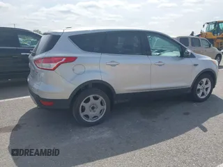 2013 Ford Escape SE with VIN 1FMCU0GX7DUB76154, listed as a IAAI auction lot 41926246 with 60,607 mi miles. Bid and sale history available at carsss.com. Image 4.