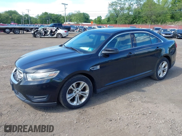 2015 Ford Taurus SEL with VIN 1FAHP2E88FG181055, listed as a IAAI auction lot 42307640 with 104,702 mi miles and . Bid and sale history available at DreamBid. Image 2.