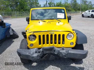 2015 Jeep Wrangler Unlimited Willys Wheeler with VIN 1C4BJWDG2FL643375, listed as a IAAI auction lot 42109724 with 112,357 mi miles and . Bid and sale history available at DreamBid. Image 12.