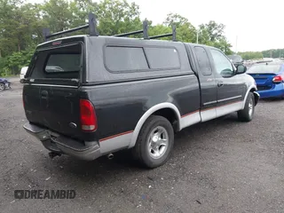 2000 Ford F-150 XL z VIN 1FTRX17L2YNB60131, wystawiony jako IAAI lot #42295537 z przebiegiem 216 638 mil mil oraz . Historia ofert i sprzedaży dostępna na DreamBid. Obrazek 4.