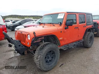 2015 Jeep Wrangler Unlimited Sahara with VIN 1C4BJWEG6FL603265, listed as a IAAI auction lot 41956606 with 70,983 mi miles. Bid and sale history available at carsss.com. Image 2.
