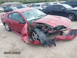 2004 Ford Mustang Standard z VIN 1FAFP40664F196973, wystawiony jako IAAI lot #42136306 z przebiegiem 126 409 mil mil oraz . Historia ofert i sprzedaży dostępna na DreamBid. Obrazek 1.