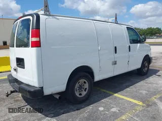 2014 Chevrolet Express Cargo Van with VIN 1GCWGFFA2E1103446, listed as a IAAI auction lot 42177760 with 91,232 mi miles. Bid and sale history available at carsss.com. Image 4.