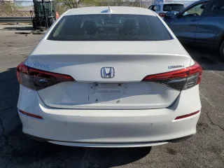 2023 Honda Civic Touring z VIN 2HGFE1F95PH314838, wystawiony jako Copart lot #52545085 z przebiegiem 29 863 mil mil oraz Szkoda całkowita • Salvage title. Historia ofert i sprzedaży dostępna na DreamBid. Obrazek 6.