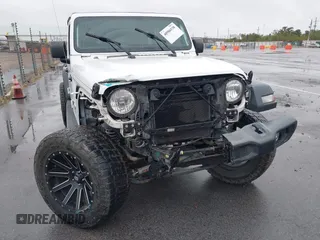 2019 Jeep Wrangler Unlimited Sport Altitude with VIN 1C4HJXDG3KW528647, listed as a IAAI auction lot 40986538 with 85,381 mi miles and . Bid and sale history available at DreamBid. Image 6.