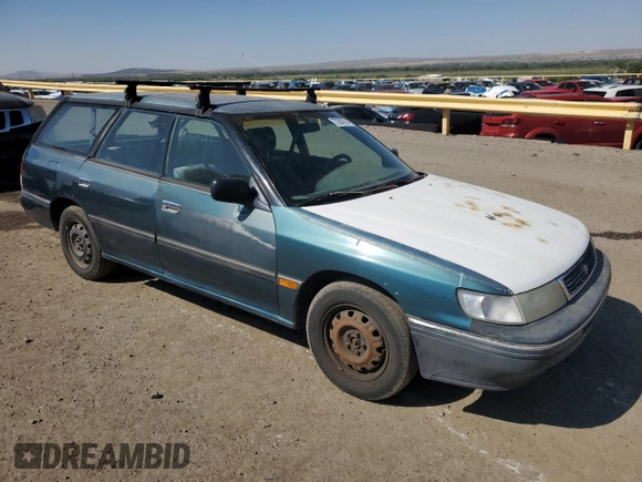 1994 Subaru Legacy L with VIN 4S3BJ6337R7955431, listed as a Copart auction lot 70200794 with 281,694 mi miles and Salvage Title. Bid and sale history available at DreamBid. Image 4.