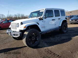 2021 Jeep Wrangler Unlimited Sahara with VIN 1C4JJXP64MW762819, listed as a Copart auction lot 49796845 with 76,543 mi miles and Salvage Title. Bid and sale history available at DreamBid. Image 1.
