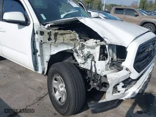 2019 Toyota Tacoma 2WD SR with VIN 5TFAX5GN6KX157413, listed as a IAAI auction lot 41165078 with 81,390 mi miles. Bid and sale history available at carsss.com. Image 6.