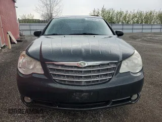 2009 Chrysler Sebring Touring z VIN 1C3LC56D69N570746, wystawiony jako Copart lot #55300405 z przebiegiem 186 391 mil mil oraz Czysty tytuł • Clean title. Historia ofert i sprzedaży dostępna na DreamBid. Obrazek 5.