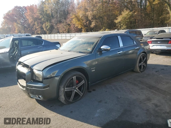 2005 Chrysler 300 with VIN 2C3JA53GX5H563815, listed as a Copart auction lot 81886344 with 144,630 mi miles and Salvage Title. Bid and sale history available at carsss.com. Image 1.