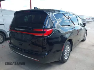2023 Chrysler Pacifica Touring L with VIN 2C4RC1BG1PR550628, listed as a IAAI auction lot 42553430 with 61,773 mi miles and . Bid and sale history available at DreamBid. Image 4.