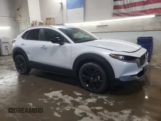 2024 Mazda CX-30 S Select Sport z VIN 3MVDMBBM1RM715881, wystawiony jako Copart lot #43393485 z przebiegiem 2535 mil mil oraz Szkody całkowita. Historia ofert i sprzedaży dostępna na DreamBid. Obrazek 4.