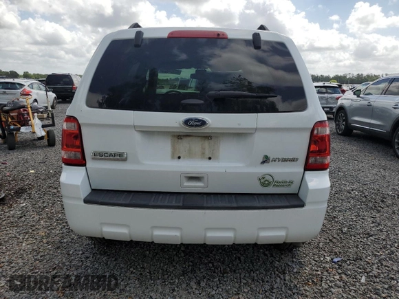 2012 Ford Escape Hybrid z VIN 1FMCU5K35CKB22024, wystawiony jako Copart lot #52204865 z przebiegiem 97 424 mil mil oraz Szkoda całkowita • Salvage title. Historia ofert i sprzedaży dostępna na DreamBid. Obrazek 6.