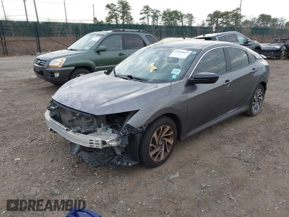 2018 Honda Civic Sedan EX with VIN 19XFC2F79JE007989, listed as a IAAI auction lot 41860829 with 72,223 mi miles. Bid and sale history available at carsss.com. Image 2.