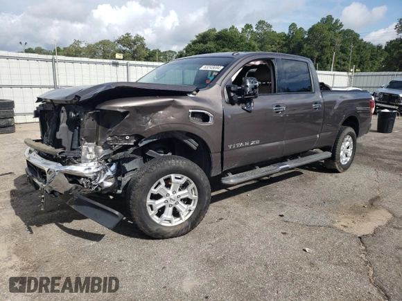 2017 Nissan Titan XD SL with VIN 1N6BA1F44HN510174, listed as a Copart auction lot 63245694 with 121,868 mi miles and Salvage Title. Bid and sale history available at carsss.com. Image 1.