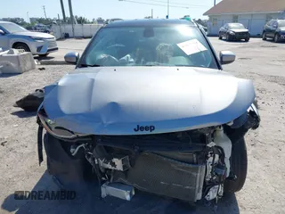 2021 Jeep Compass Altitude with VIN 3C4NJCBB5MT509187, listed as a IAAI auction lot 42021788 with 51,841 mi miles. Bid and sale history available at carsss.com. Image 6.