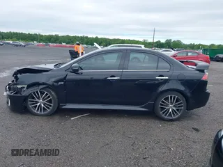 2017 Mitsubishi Lancer ES z VIN JA32V2FW6HU001870, wystawiony jako IAAI lot #42333550 z przebiegiem 75 938 mil mil oraz . Historia ofert i sprzedaży dostępna na DreamBid. Obrazek 14.