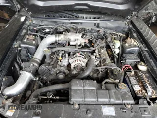 2000 Ford Mustang GT with VIN 1FAFP42X0YF257004, listed as a Copart auction lot 56424425 with 117,016 mi miles and Salvage Title. Bid and sale history available at DreamBid. Image 11.