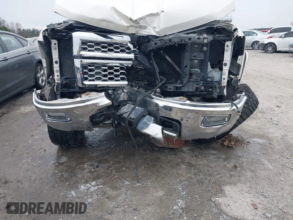 2014 Chevrolet Silverado 1500 LTZ with VIN 3GCUKSEJ3EG434991, listed as a IAAI auction lot 41385058 with 106,183 mi miles and . Bid and sale history available at DreamBid. Image 6.
