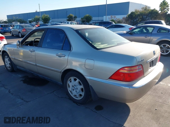 1999 Acura RL with VIN JH4KA9661XC005883, listed as a IAAI auction lot 40560595 with 165,195 mi miles. Bid and sale history available at carsss.com. Image 3.