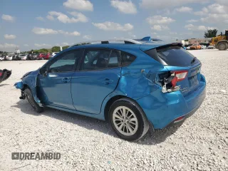 2017 Subaru Impreza Premium with VIN 4S3GTAD65H3703808, listed as a Copart auction lot 57396095 with 68,960 mi miles and Salvage title. Bid and sale history available at DreamBid. Image 2.
