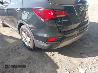 2017 Hyundai Santa Fe 2.4L z VIN 5NMZU3LB2HH037704, wystawiony jako IAAI lot #42113964 z przebiegiem 125 488 mil mil oraz . Historia ofert i sprzedaży dostępna na DreamBid. Obrazek 6.