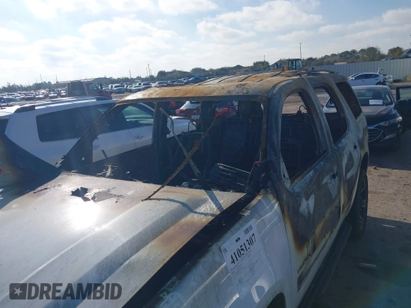 2014 Chevrolet Tahoe LT with VIN 1GNSCBE00ER247632, listed as a IAAI auction lot 41051307 with Not provided miles and . Bid and sale history available at DreamBid. Image 6.