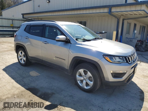 2019 Jeep Compass Latitude with VIN 3C4NJDBB1KT703251, listed as a Copart auction lot 52760895 with 73,026 mi miles and Salvage Title. Bid and sale history available at DreamBid. Image 4.
