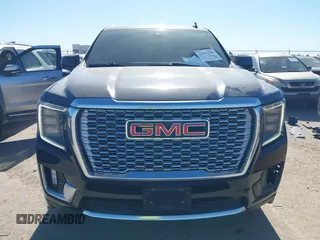 2021 GMC Yukon Denali with VIN 1GKS2DKL1MR135771, listed as a IAAI auction lot 41403680 with 61,772 mi miles. Bid and sale history available at carsss.com. Image 12.