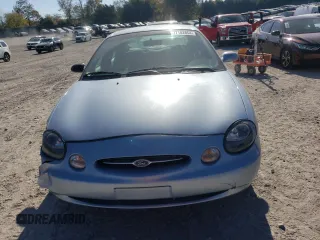1998 Ford Taurus LX z VIN 1FAFP52U5WA273382, wystawiony jako Copart lot #77102854 z przebiegiem 73 014 mil mil oraz Szkoda całkowita • Salvage title. Historia ofert i sprzedaży dostępna na DreamBid. Obrazek 5.