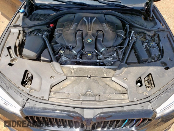 2018 BMW 5 Series M550i xDrive with VIN WBAJB9C54JB286450, listed as a Copart auction lot 61232125 with 88,479 mi miles and Salvage title. Bid and sale history available at DreamBid. Image 11.