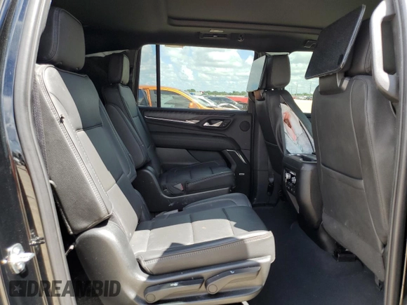 2023 GMC Yukon XL Denali with VIN 1GKS2JKT2PR438920, listed as a Copart auction lot 69749244 with 23,817 mi miles and Salvage Title. Bid and sale history available at DreamBid. Image 11.