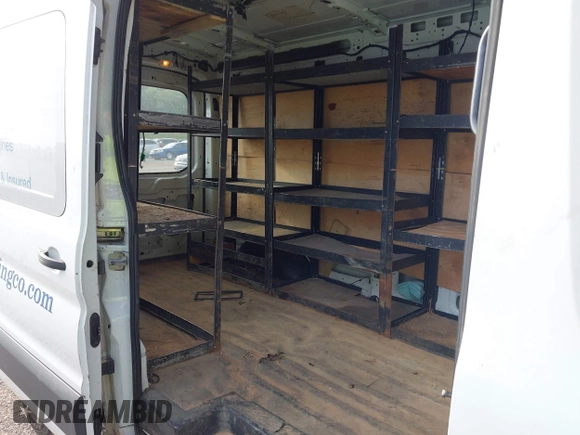 2015 Ford Transit Cargo with VIN 1FTNE2CM7FKA78466, listed as a IAAI auction lot 42074455 with 214,797 mi miles and . Bid and sale history available at carsss.com. Image 8.