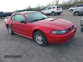 2001 Ford Mustang Standard with VIN 1FAFP40421F191957, listed as a IAAI auction lot 42005976 with 52,882 mi miles. Bid and sale history available at carsss.com. Image 1.