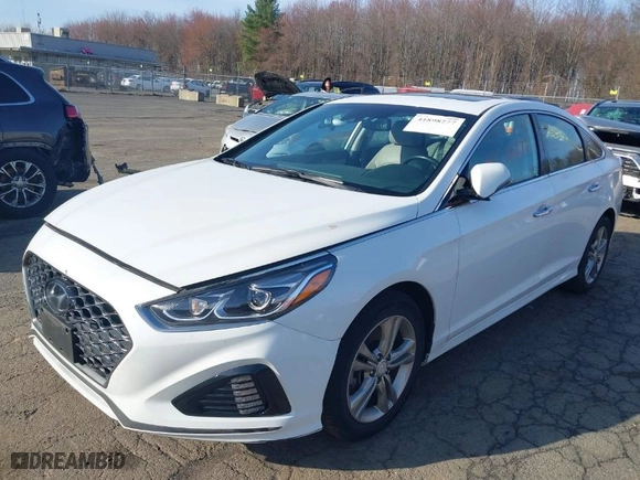 2019 Hyundai Sonata Sport with VIN 5NPE34AF0KH737194, listed as a IAAI auction lot 41898277 with 72,142 mi miles. Bid and sale history available at carsss.com. Image 2.