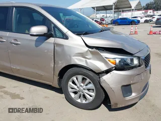 2017 Kia Sedona LX with VIN KNDMB5C16H6254544, listed as a IAAI auction lot 41961809 with 124,658 mi miles. Bid and sale history available at carsss.com. Image 6.